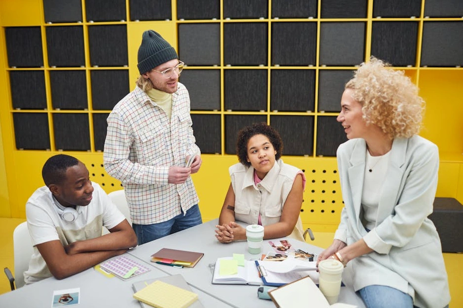 Diverse team of financial professionals collaborating around a large table